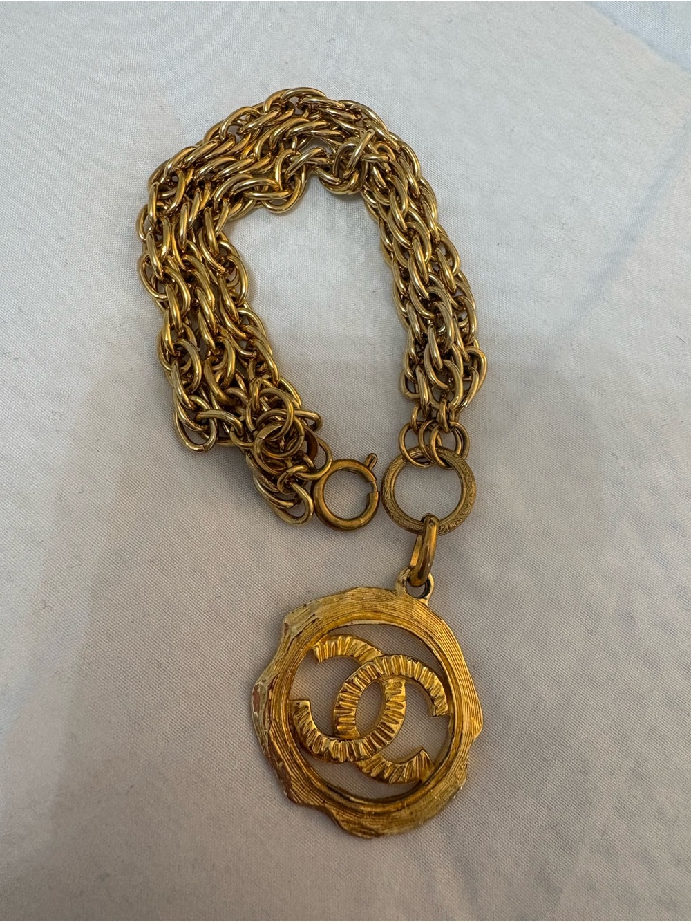 Chanel Gold-Tone Interlocking Pendant bracelet